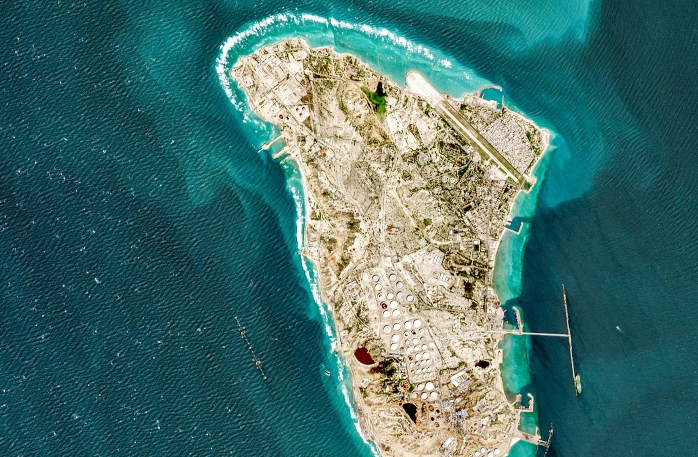 Trump's Warning Shot: US Bombs Iran's Energy Lifeline, Sends USS Tripoli to Middle East