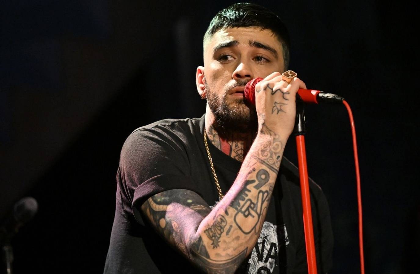 Zayn Malik Targeted with Water Bottles at Kingston Event