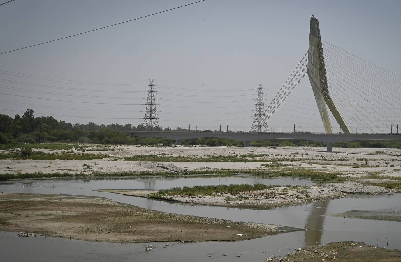 Delhi Residents Struggle as Yamuna Water Levels Plummet Amid Heatwave